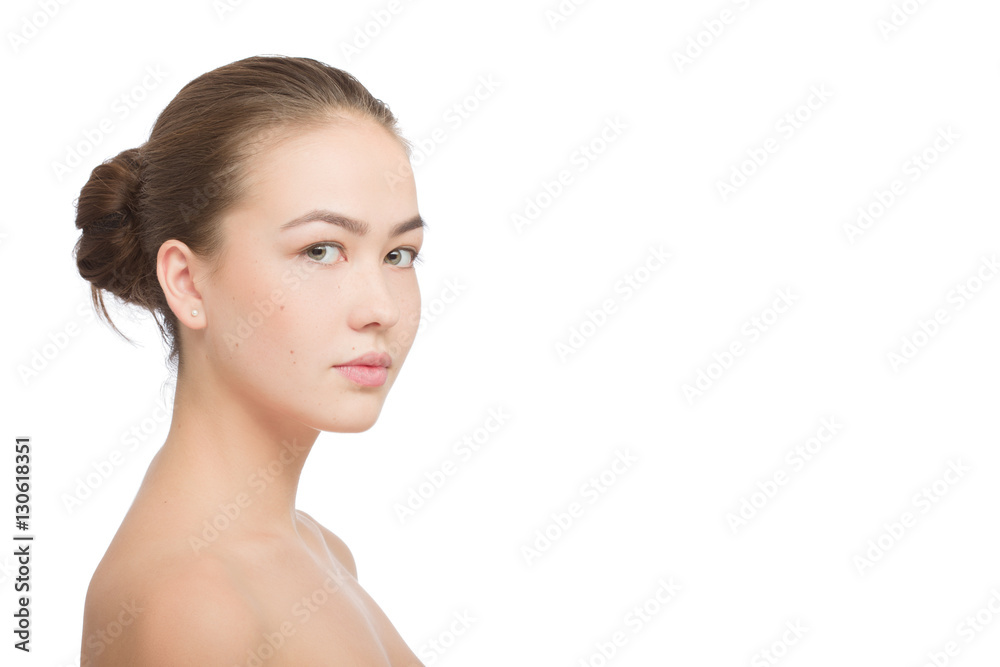 Woman with a natural beauty makeup look isolated over a white background with copyspace Woman with a natural beauty makeup look isolated over a white background with copyspace