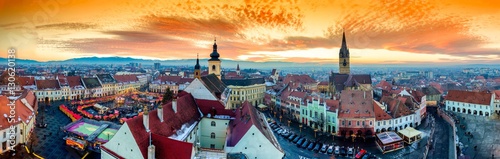 Panoramic view of Sibiu central square in Transylvania, Romania. City also known as Hermannstadt. Sunset HDR hi-resolution photography. photo