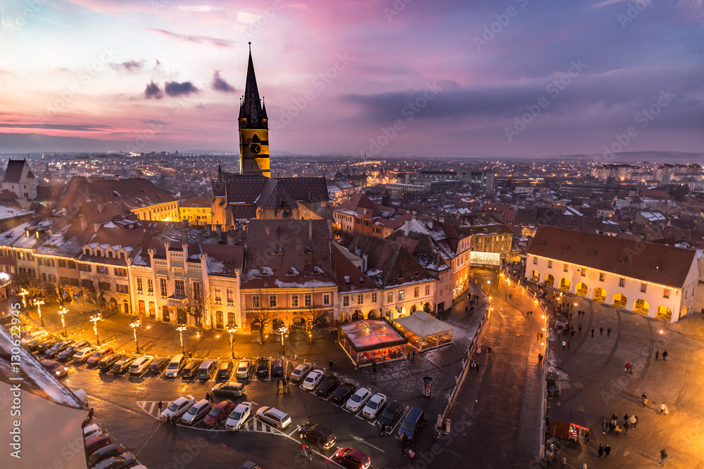 Naklejka premium Sibiu, Transylvania, Romania central square at sunset.
