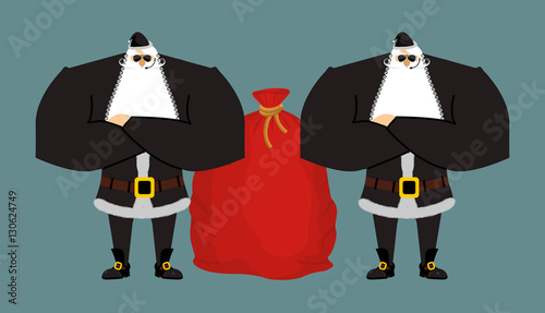 Santa Claus bodyguards. Christmas security guards. Protecting re