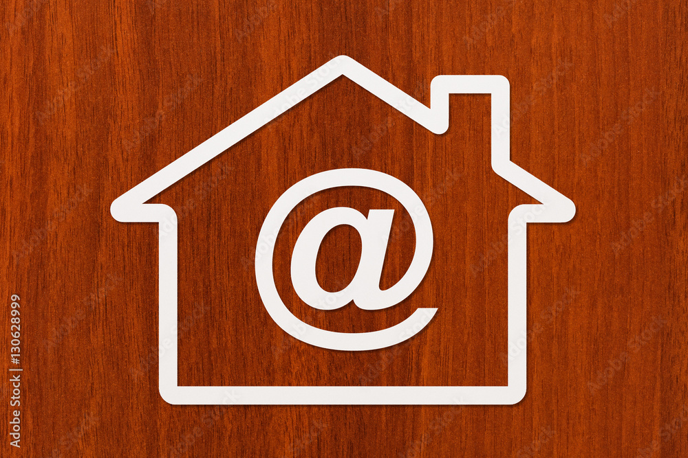 Paper house with email sign inside. Abstract conceptual image Paper house with email sign inside. Abstract conceptual image