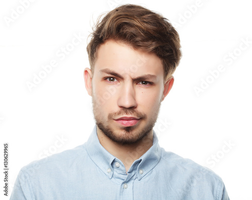 Casual man posing casually over white