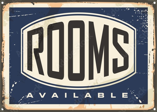 Rooms available vintage hotel sign on old metal texture 