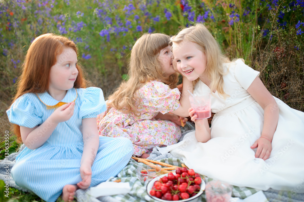 happy children having picnic outdoors. Two girlfriends shared happy children having picnic outdoors. Two girlfriends shared