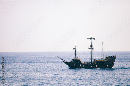 old ship sail in lagoon
