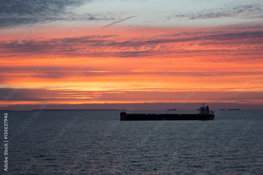 Oil product tanker during beautiful sunset.