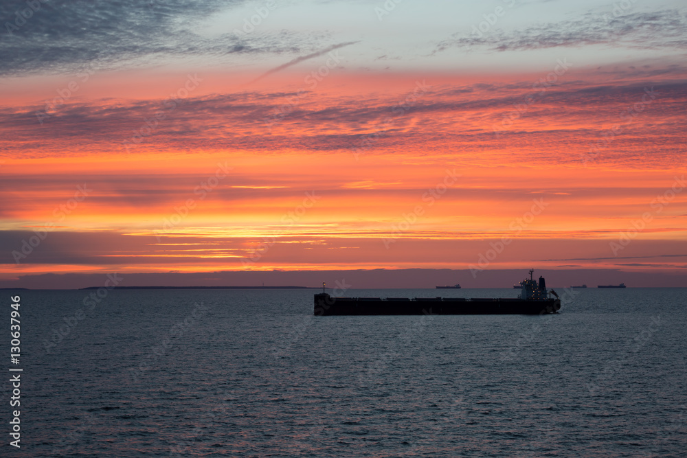 Oil product tanker during beautiful sunset. Oil product tanker during beautiful sunset.