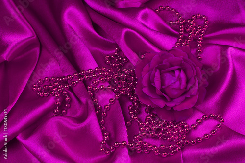 pink rose and pearls on satin