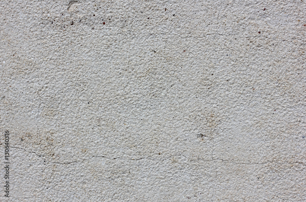 Fototapeta premium plastered cracked gray wall abstract texture background