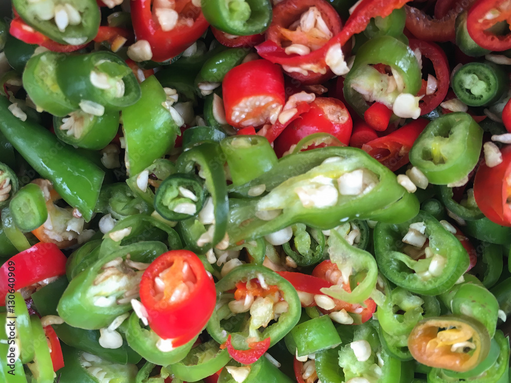 Chilli Padi, Bird's Eye Chilli, Bird Chilli or Thai pepper slice on the background Chilli Padi, Bird's Eye Chilli, Bird Chilli or Thai pepper slice on the background