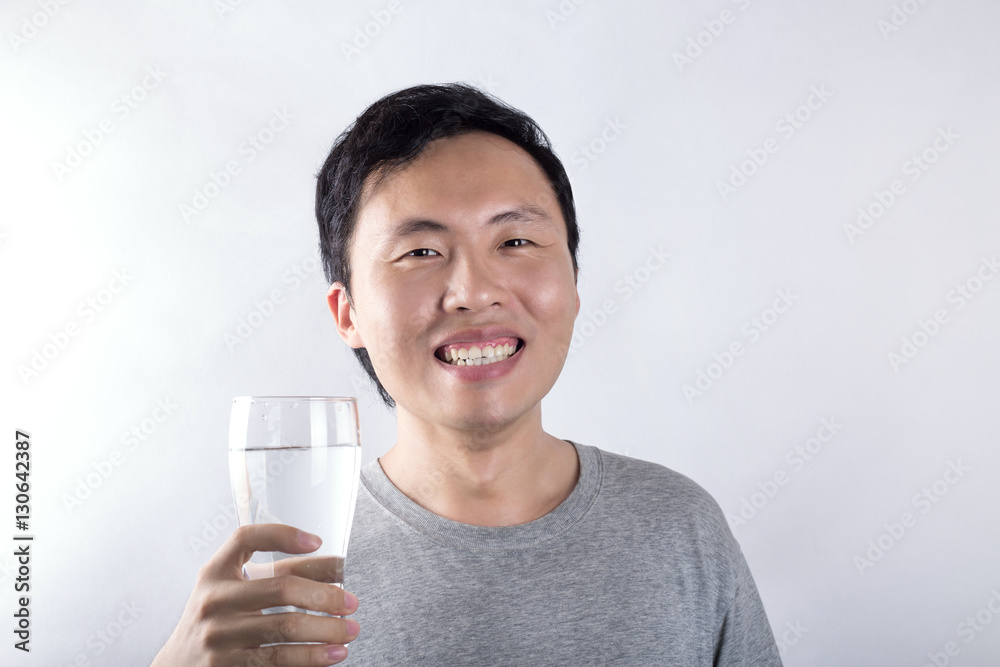 Asian man drinking water