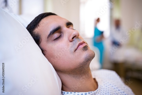 Close-up of patient sleeping on bed