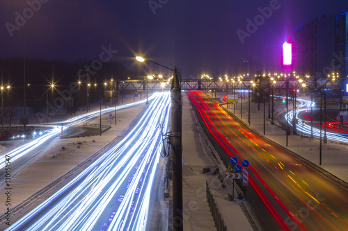 Night road in the city with car the light trails