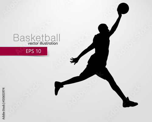 Silhouette of a basketball player.