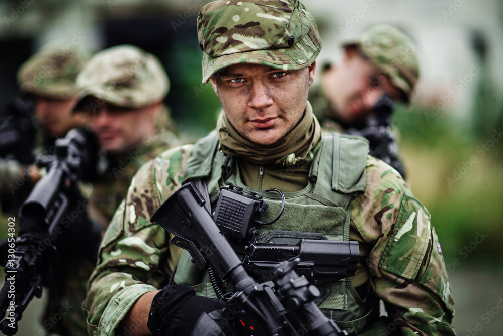 Army sniper during the military operation in the city. war, army Army sniper during the military operation in the city. war, army