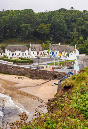 Colourful houses around the sandy bay of Dunmore East, Waterford, Republic of Ireland photo