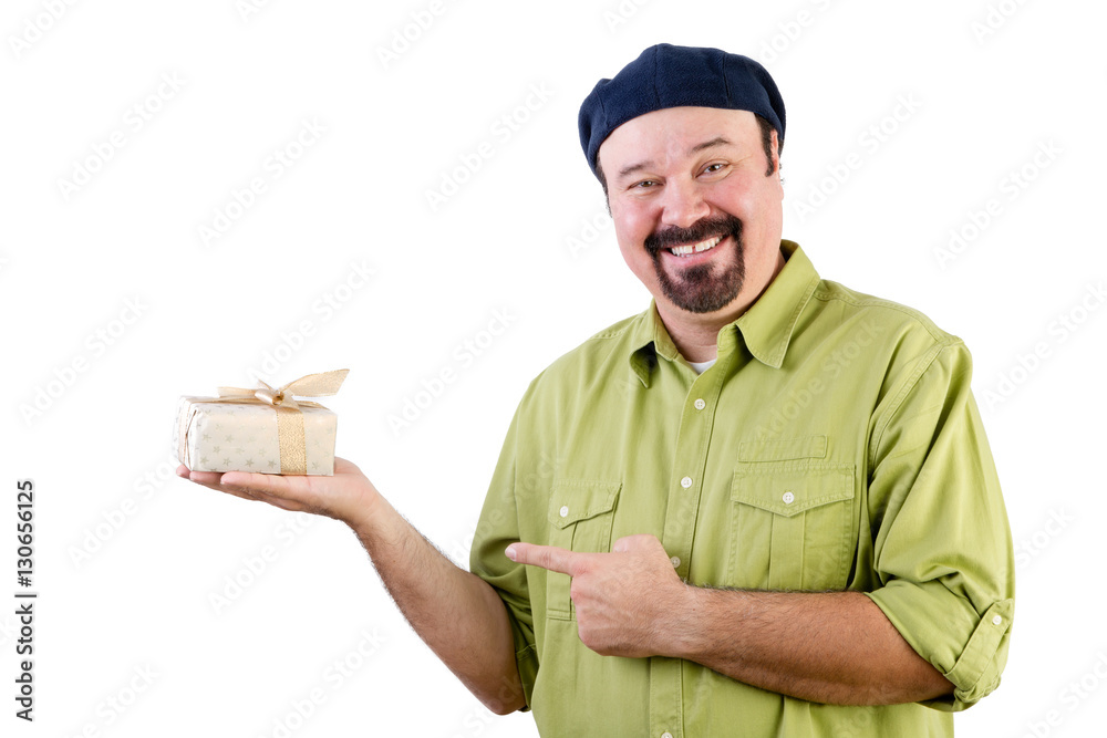 Smiling man in beret holding wrapped gift on white Smiling man in beret holding wrapped gift on white