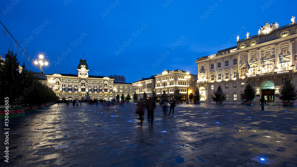 Piazza Unità d'Italia in Trieste, Italy,headed by the city's municipal building by night.