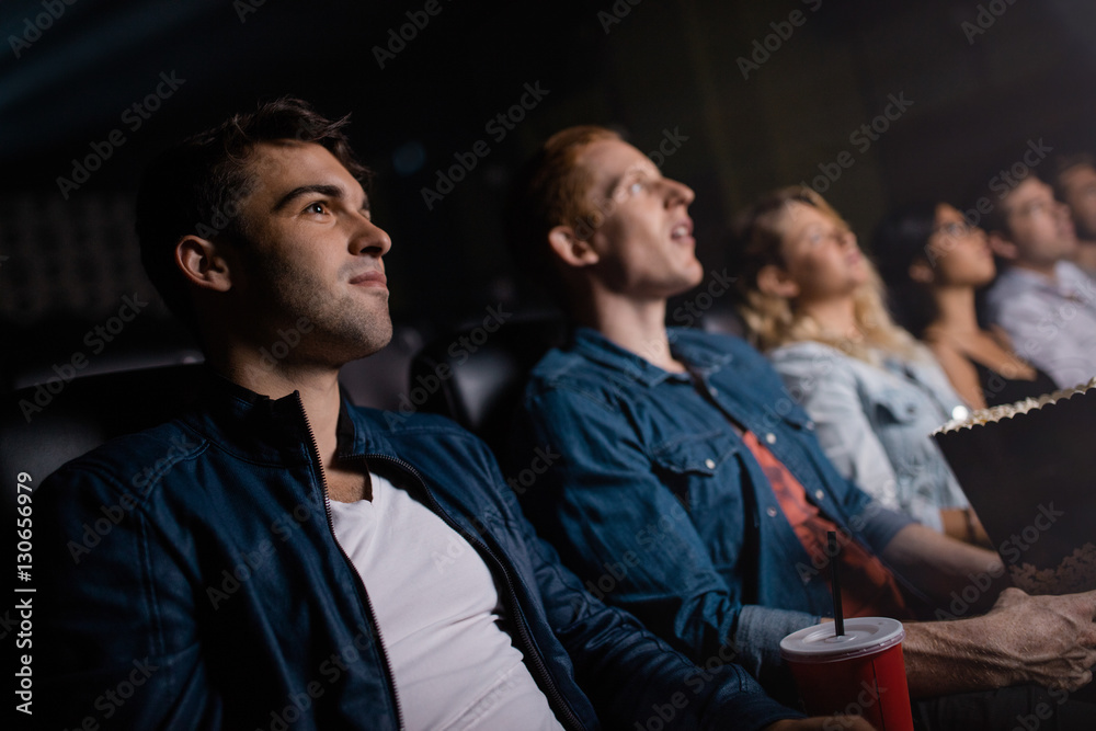 Group of people in multiplex theater Group of people in multiplex theater