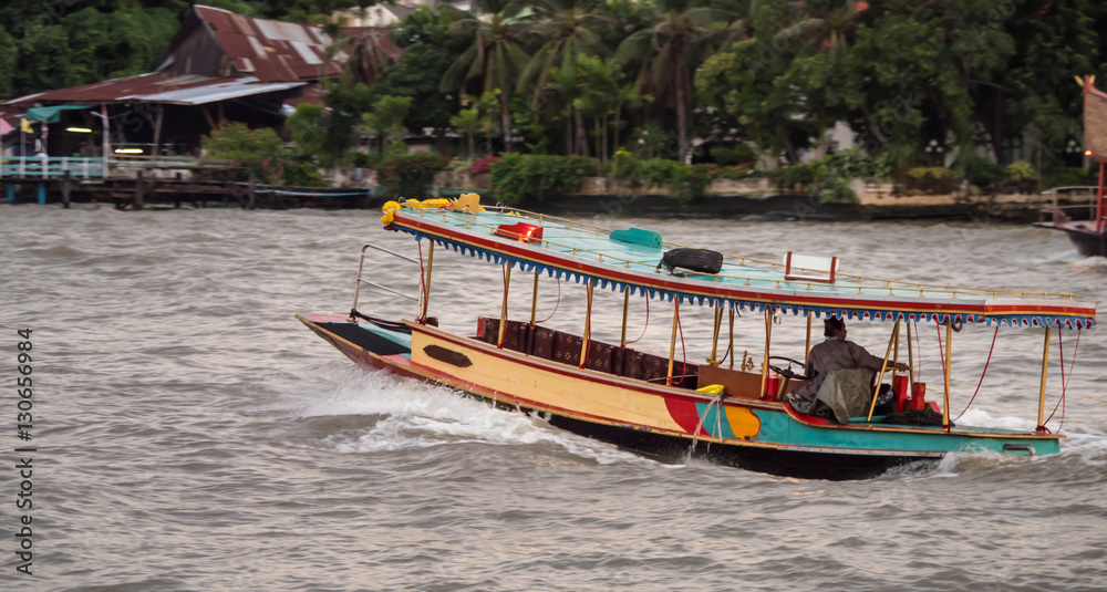 Small motor boat in Chao Phraya River