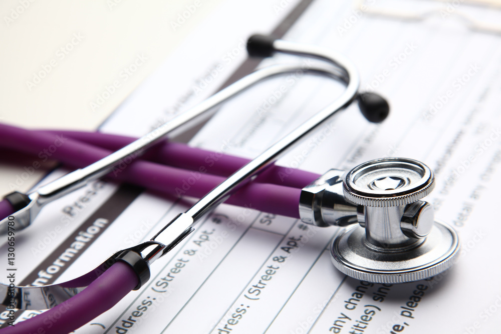 Closeup of a medical stethoscope with folder Closeup of a medical stethoscope with folder