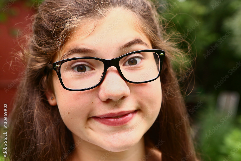 short sighted teen girl in myopia glasses short sighted teen girl in myopia glasses