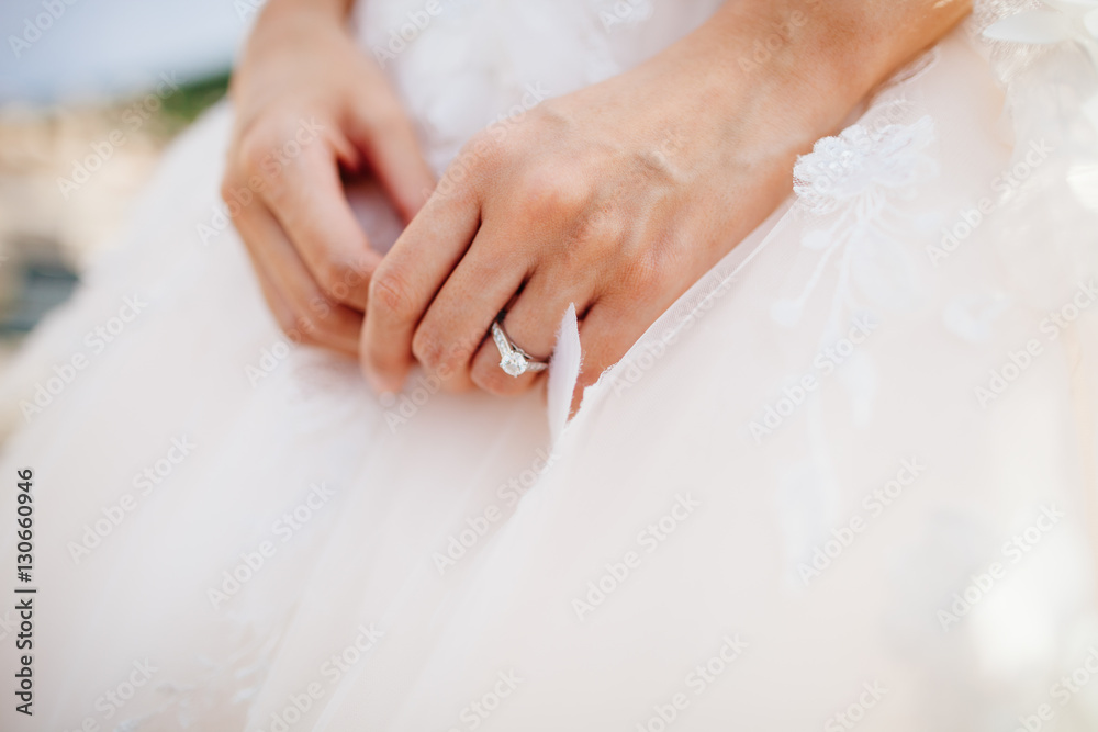 engagement ring on bride's hand engagement ring on bride's hand