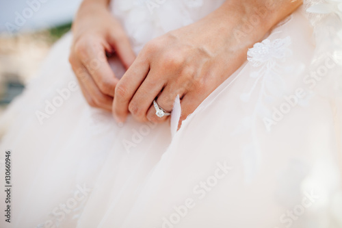 engagement ring on bride's hand