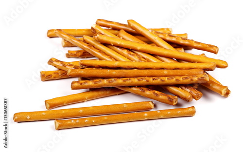 salty cracker pretzel sticks isolated on white background