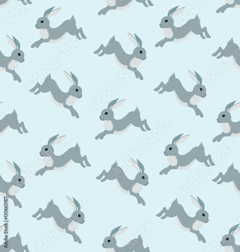 Seamless pattern with gray running hare on the blue background