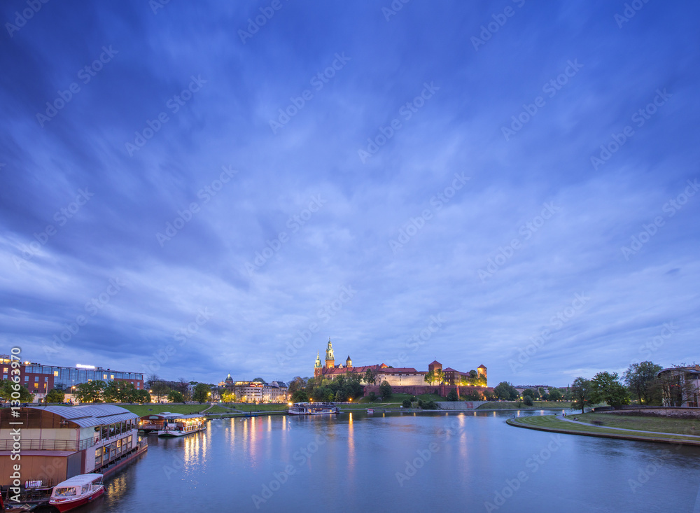 dark evening sky above castle and river
