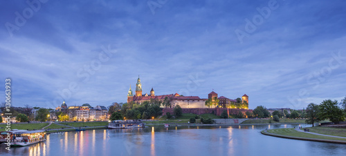 panoramic view to castle on the river in twilight time