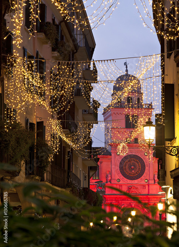 The clock tower in Piazza dei Signori in Padua, Italy, with christmas lights.