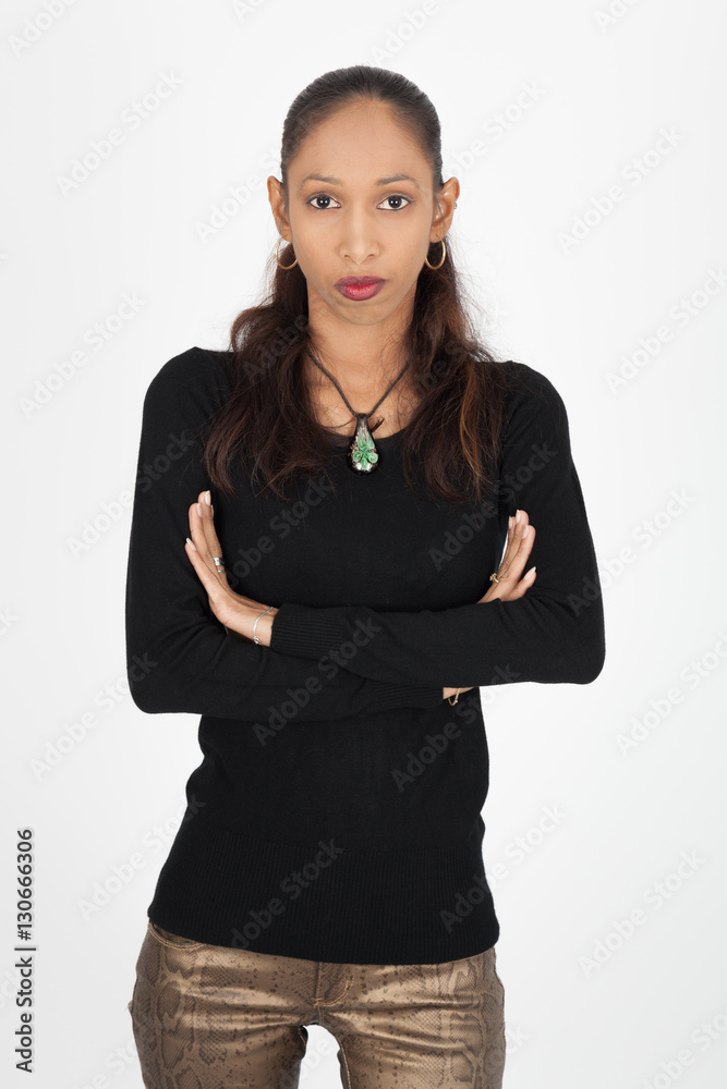 Beautiful woman doing different expressions in different sets of clothes: arms crossed Beautiful woman doing different expressions in different sets of clothes: arms crossed