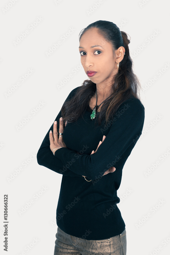 Beautiful woman doing different expressions in different sets of clothes: arms crossed Beautiful woman doing different expressions in different sets of clothes: arms crossed