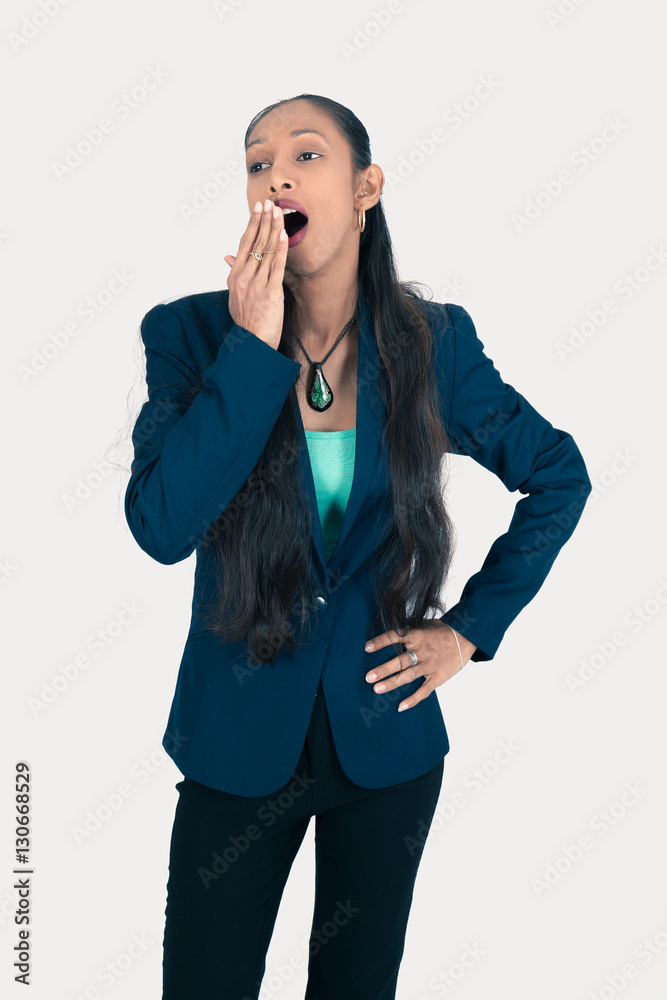 Beautiful woman doing different expressions in different sets of clothes: yawn