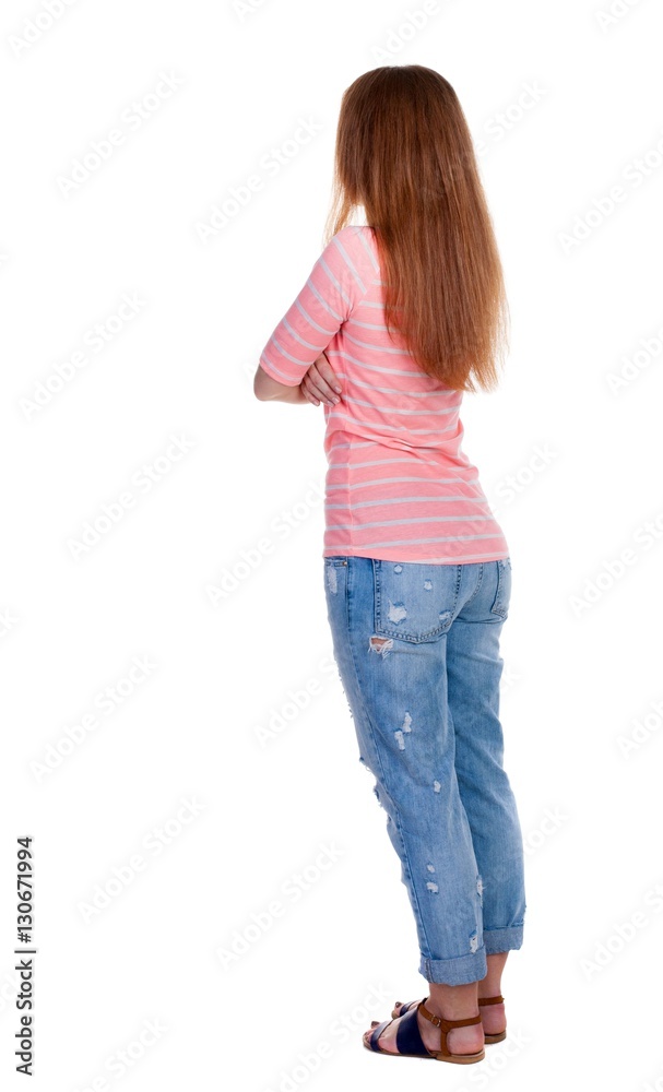 back view of standing young beautiful redhead woman. back view of standing young beautiful redhead woman.