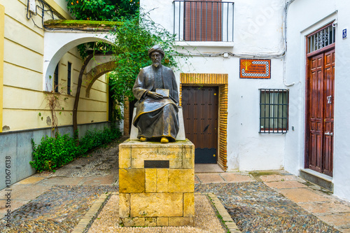 Statue of Ben Maimonides in the Jewish Quarter of cordoba photo