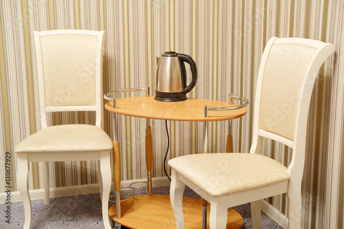 Table and chairs in a hotel room