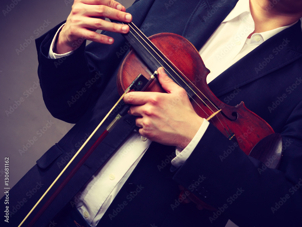 Man man dressed elegantly holding violin Man man dressed elegantly holding violin