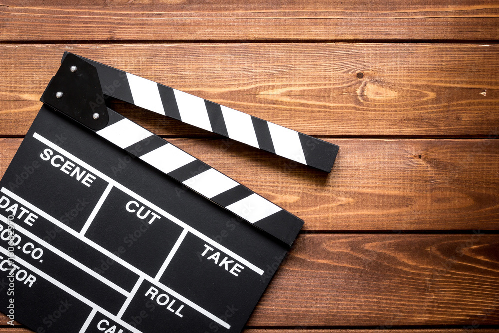 Obraz premium Work screenwriter on wooden background top view