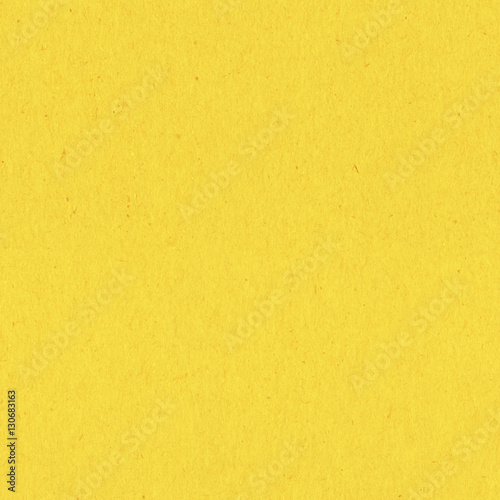 Seamless yellow construction paper background wallpaper. 