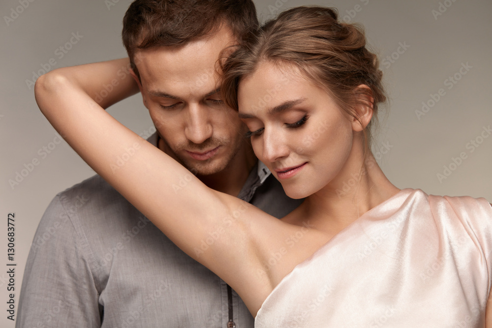 Man Close To Sexy Woman. Female Showing Smooth Skin Of Armpits. Man Close To Sexy Woman. Female Showing Smooth Skin Of Armpits.