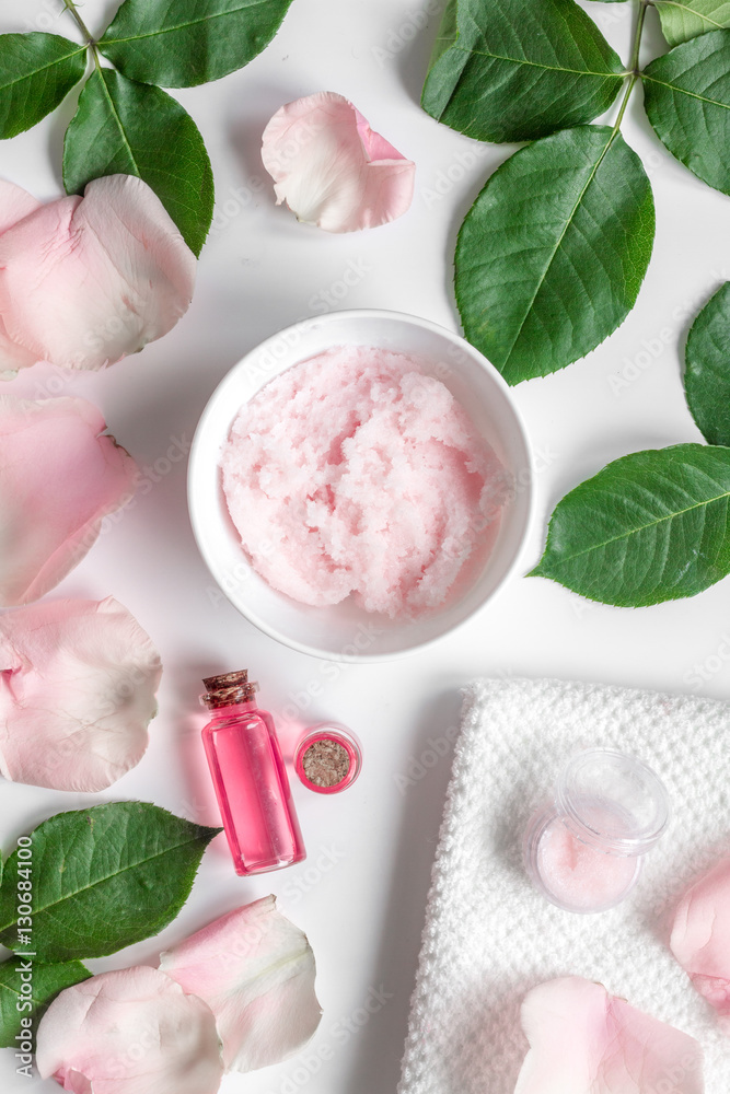 organic cosmetic with rose oil on white background top view organic cosmetic with rose oil on white background top view