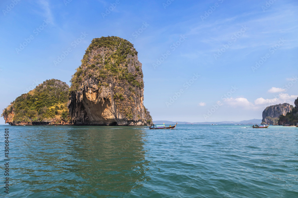Naklejka premium Small limestone island in andaman sea at Railay beach krabi Thailand