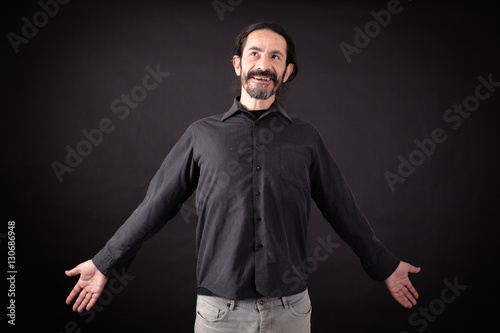 Handsome man doing different expressions in different sets of clothes: joy