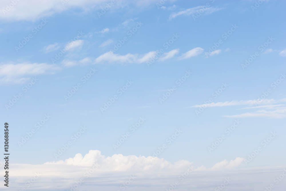 Fototapeta premium Fantastic soft white clouds against blue sky background, soft fo