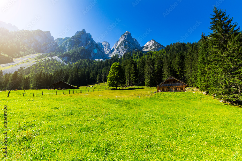 Sunny summer morning on the Gosau Lake (Vorderer Gosausee). Colorful outdoor scene in Upper Austrian Alps, Salzkammergut region, Austria, Europe. Artistic style post processed photo.