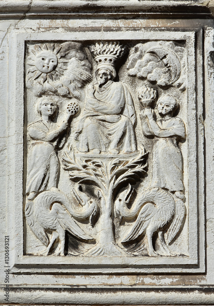 God with Sun and Moon old relief in Venice