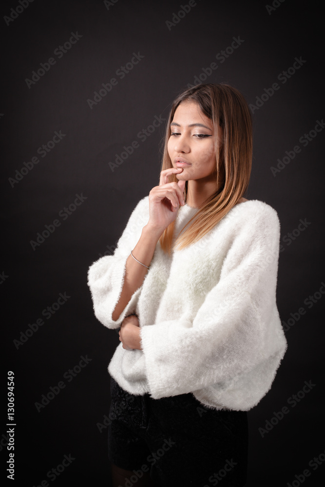 Beautiful woman doing different expressions in different sets of clothes: thinking Beautiful woman doing different expressions in different sets of clothes: thinking